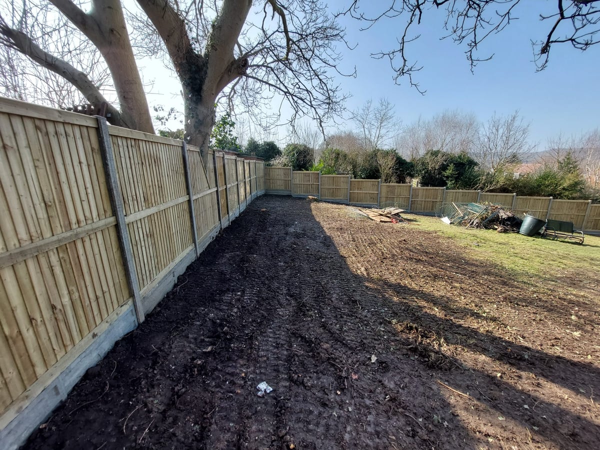 New garden boundary fencing following the line of a large back garden